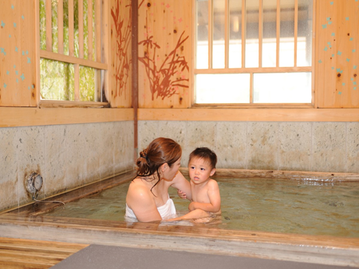 dominique lugo add japanese mom and son shower photo